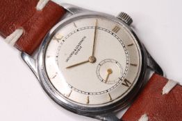 VINTAGE VACHERON & CONSTANTIN GENEVE STEEL CASED DRESS WATCH, circular stepped dial, with applied