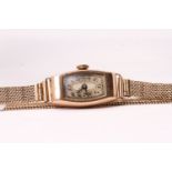 Art Deco 9ct Cocktail watch, rectangular cushion dial with Arabic numerals, 14mm tonneau shaped