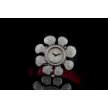 LADIES 18K DAMOISELLE D FULLY LOADED DIAMOND WATCH,round, pave set diamond dial with black hands,