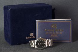 GENTLEMENS GRAND SEIKO DATE WRISTWATCH W/ BOX & BOOKLET REF. FBGX0419F620A10, circular black gloss