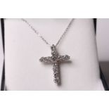 18ct white gold diamond cross and chain, round brilliant cut diamonds total approximately 2.32ct,