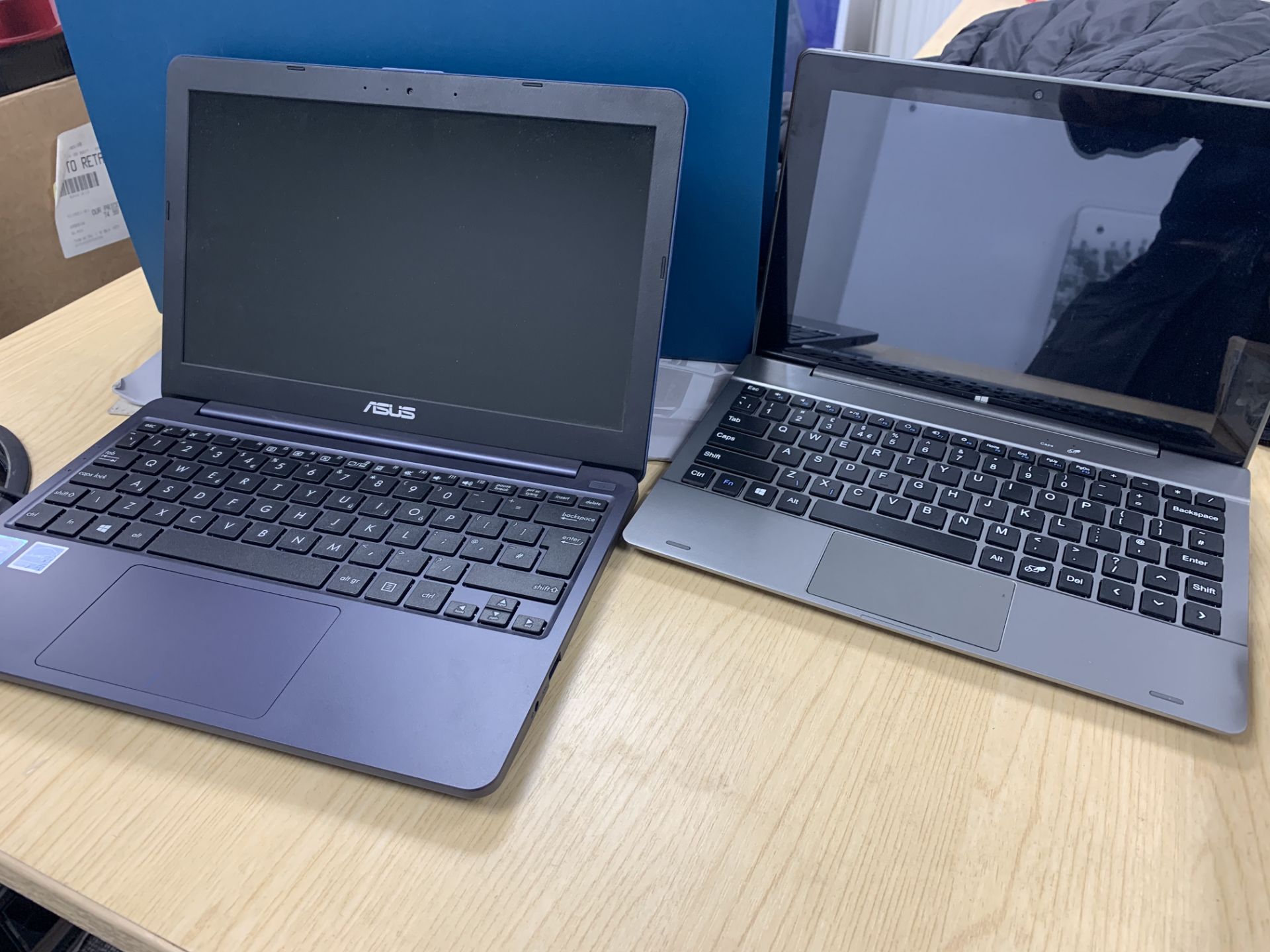 2 X NOTEBOOKS IE DUO.TAB AND ASUS WITH CHARGERS ( PLEASE NOTE THESE ITEMS ARE RETURNS )