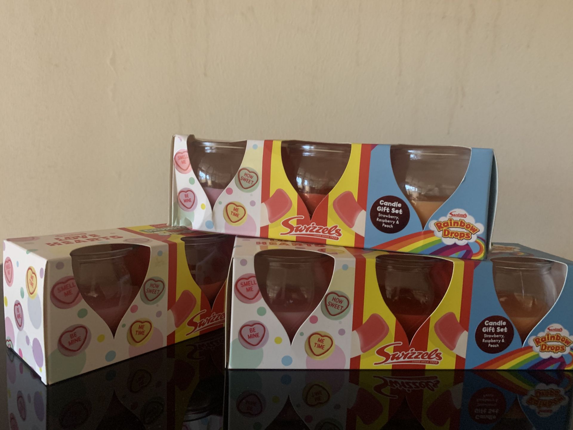 12 X BRAND NEW SWIZZLES 3 JAR CANDLE SETS INCLUDING LOVE HEARTS, DRUMSTICK AND RAINBOW DROPS