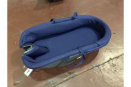 BLUE CARRY COT ( PLEASE NOTE HANDLES ARE MISSING