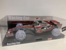12 X BRAND NEW ULTRASONIC SOUND AND LIGHT UP RACING CARS IN 2 BOXES RRP £19.99 ( EACH CAR )