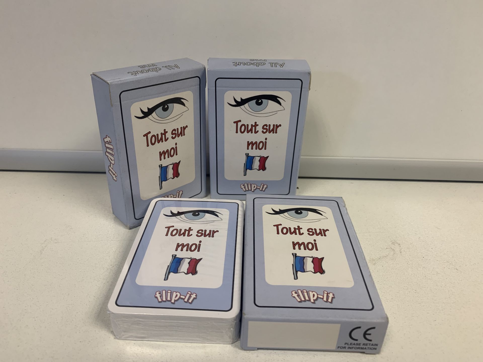 60 X BRAND NEW TTS FLIP IT FRENCH ALL ABOUT ME GAMES