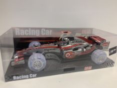 4 X BRAND NEW ULTRASONIC SOUND AND LIGHT UP RACING CARS IN 2 BOXES RRP £19.99 ( EACH CAR )