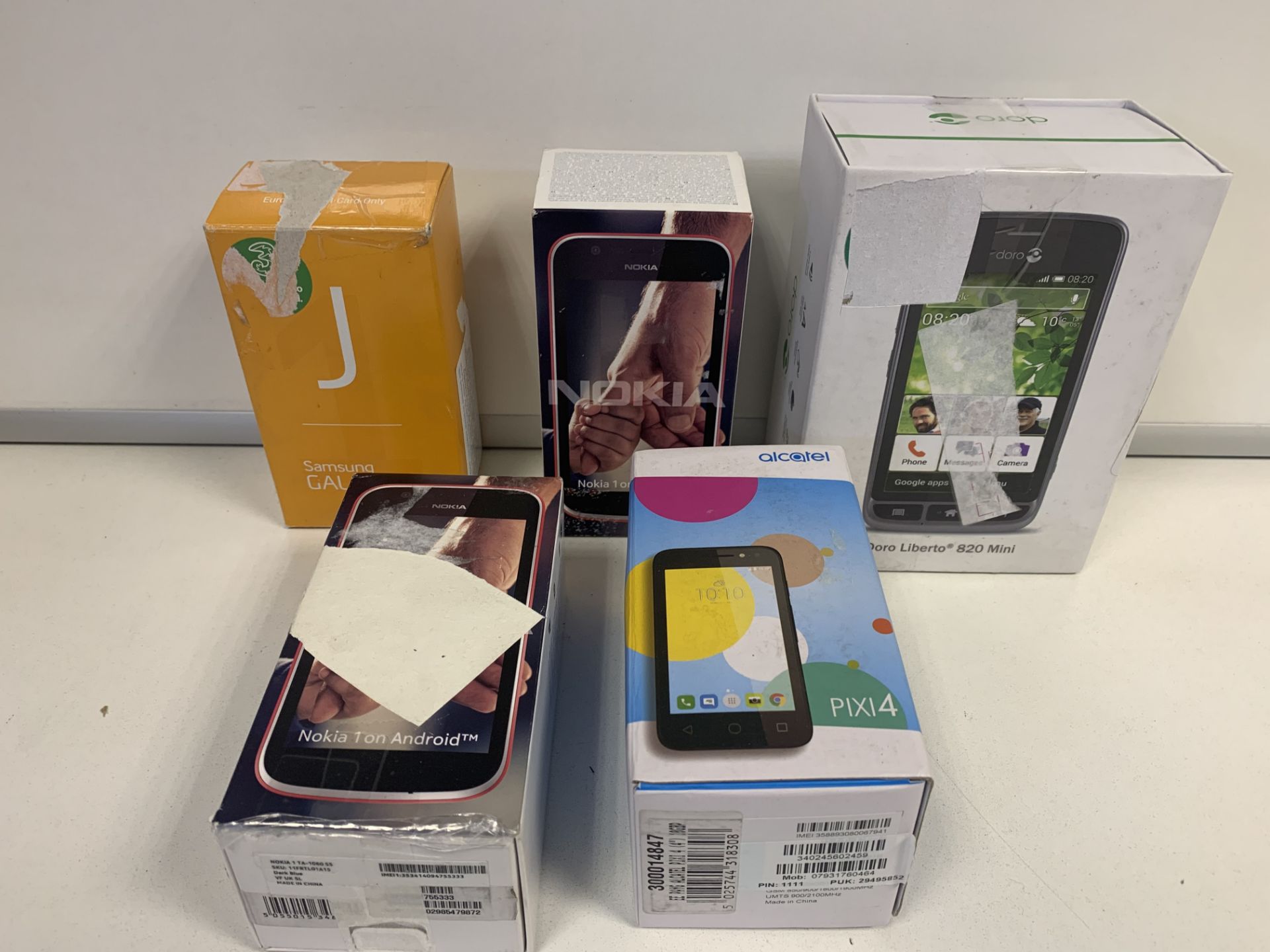 5 X RETAIL BOXED OPEN NETWORK MOBILE PHONES INCLUDING SAMSUNG GALAXY J1, DORO LIBERTO, ETC