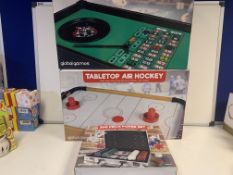 LOT CONTAINING 2 X GLOBAL GIZMOS TABLE TOP AIR HOCKEY, TABLE TOP ROULETTE, 200 PIECE POKER SET