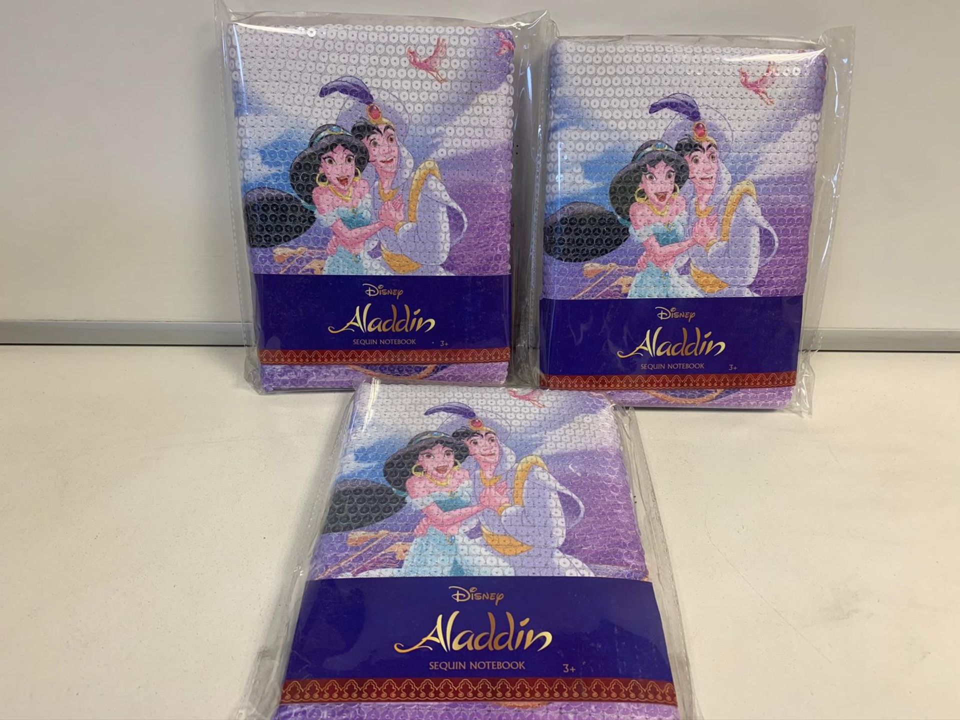 96 x BRAND NEW PACKAGED DISNEY ALADDIN SEQUIN NOTEBOOK. RRP £8.99 EACH