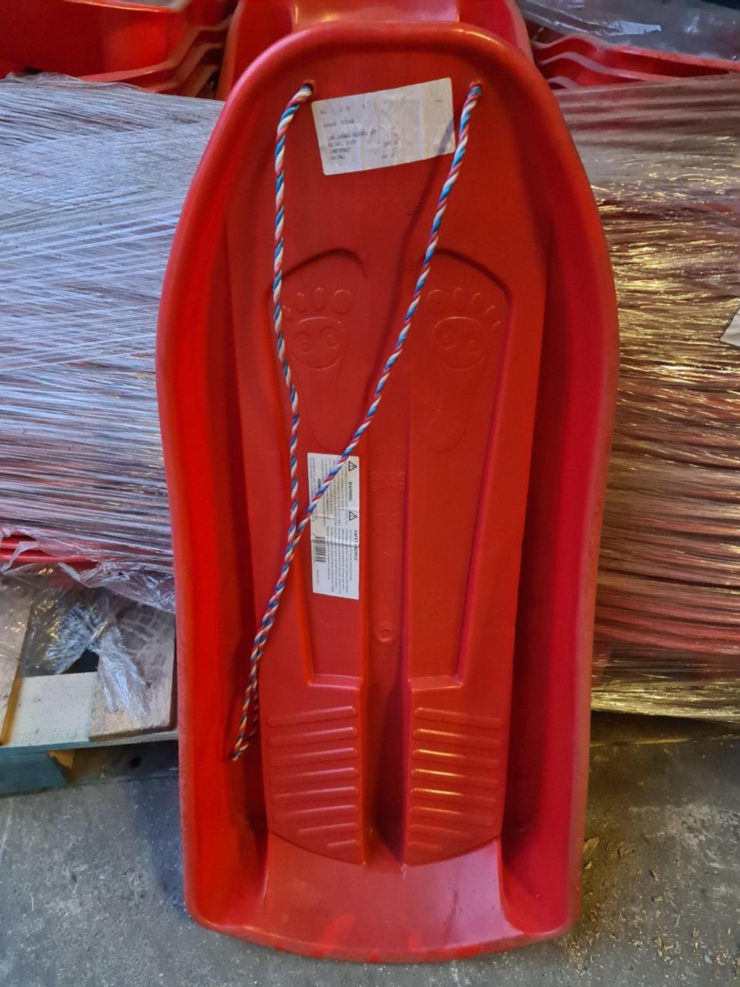PALLET TO CONTAIN 60 x RED SNOW SLEDGES - Image 2 of 2