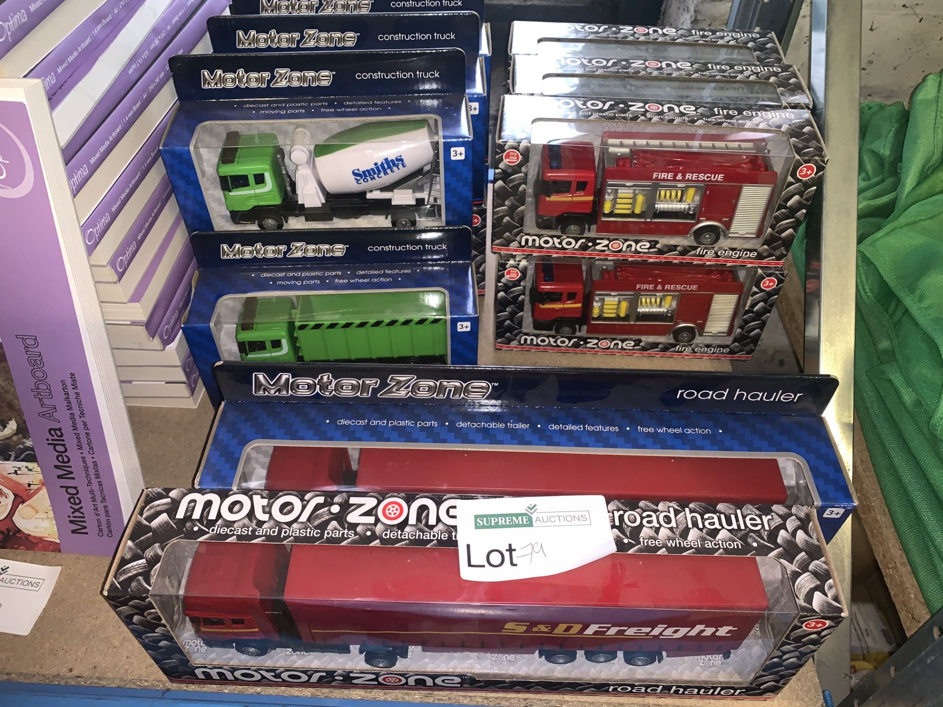 LOT CONTAINING MOTOR ZONE TOY VEHICLES INCLUDING FIRE AND RESCUE, ROAD HAULER, CONSTRUCTION TRUCK,