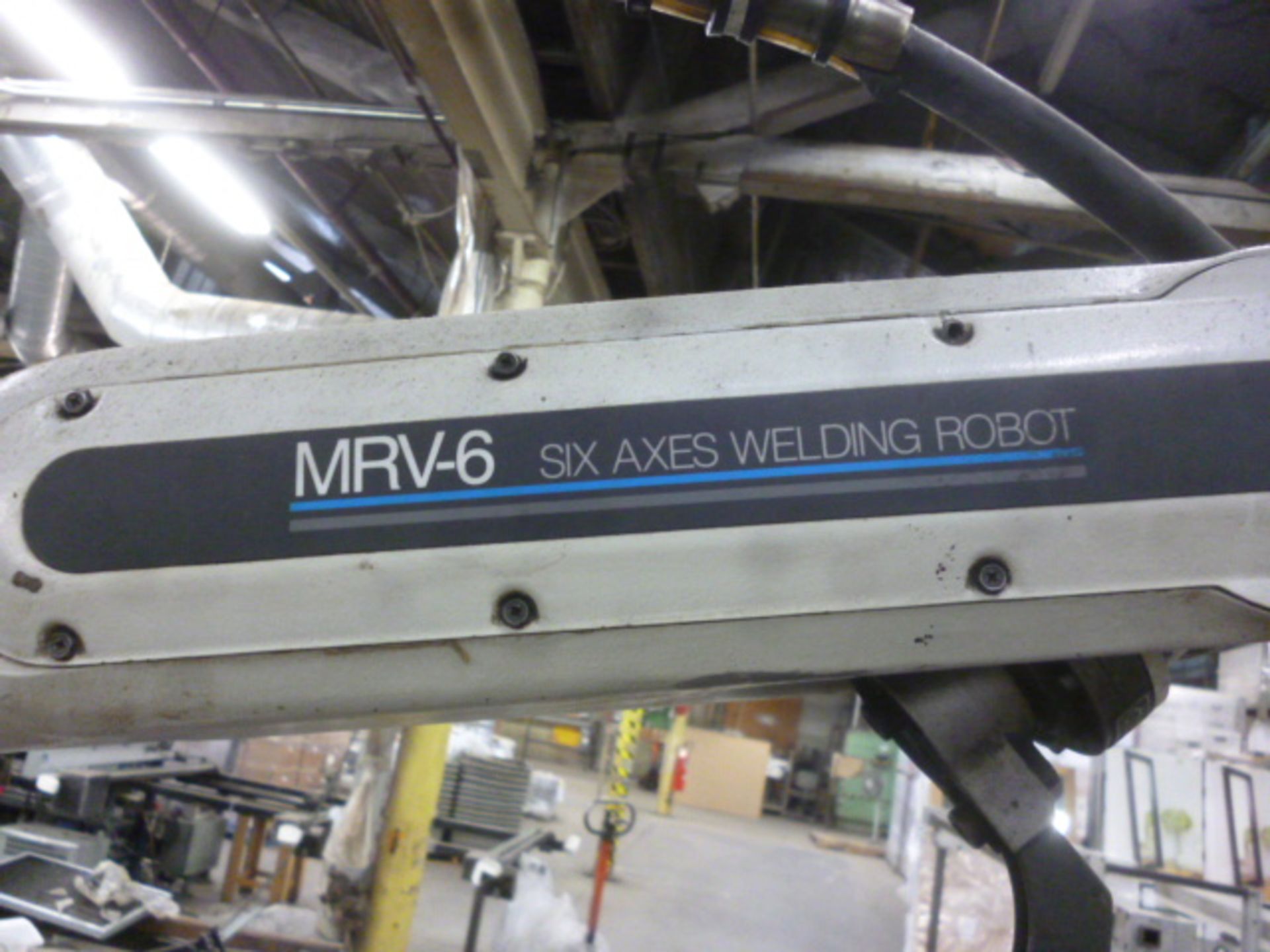 Miller 6-axis robot inoculating a Delta weld CV.DC power welding source. - Image 2 of 7