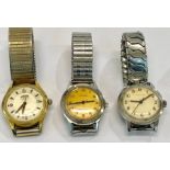 3 vintage gents wristwatches includes 2 garrard and roamer allwatch are ticking but no warranty give