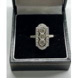 Fine art deco style 18ct diamond ring 1.3 ct set with 3 central with small diamonds around