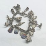 Vintage solid silver charm bracelet with & 19 charms several open