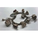 Vintage silver charm bracelet weight approx 64g