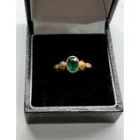 Antique 22ct gold ring set with green stone weight 3.1g