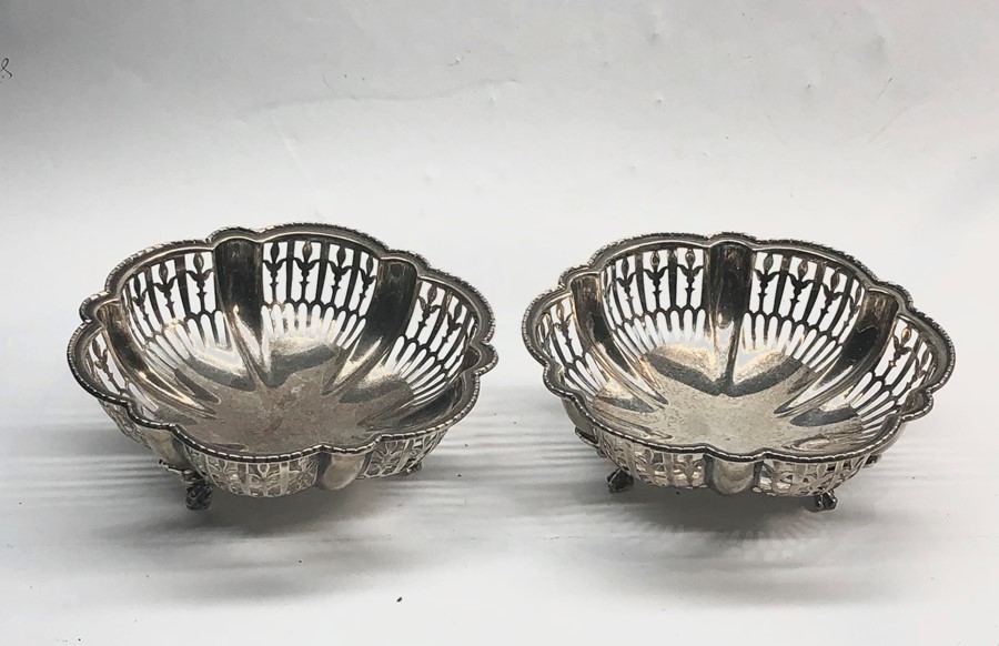 Pair of antique silver pierced sweet dishes Birmingham silver hallmarks each measures approx 12.5cm