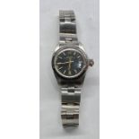 Ladies Rolex Oyster Perpetual wristwatch small crack to glass shown in image black dial in working o