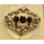 Large victorian gold and garnet set brooch the brooch is not hallmarked but acid tested as gold case