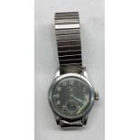 WW2 Record Dirty dozen military wristwatch watch is nor working minute hand has come away and the wa