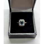 Fine platinum Aquamarine and diamond ring central stone measures approx 7mm by 5mm set with small di