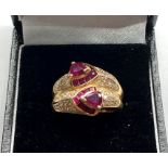 Fine 18ct gold diamond and ruby ring 0.70 diamonds 0.51and 0.55 rubies weight of ring 7.9g