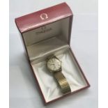 Vintage gents 9ct gold Omega wrist watch is in good condition and working but no warranty is given