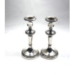 Pair of silver candle sticks Birmingham silver hallmarks they measure approx 15cm tall filled bases