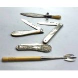 selection of silver items includes 2 antique silver fruit knives pickle fork and page marker