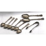 Set of ornate silver hallmarked spoons and sugar tongues sheffield silver hallmarks weight 140g