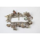 Vintage heart padlock loaded sterling silver charm bracelet (67g)