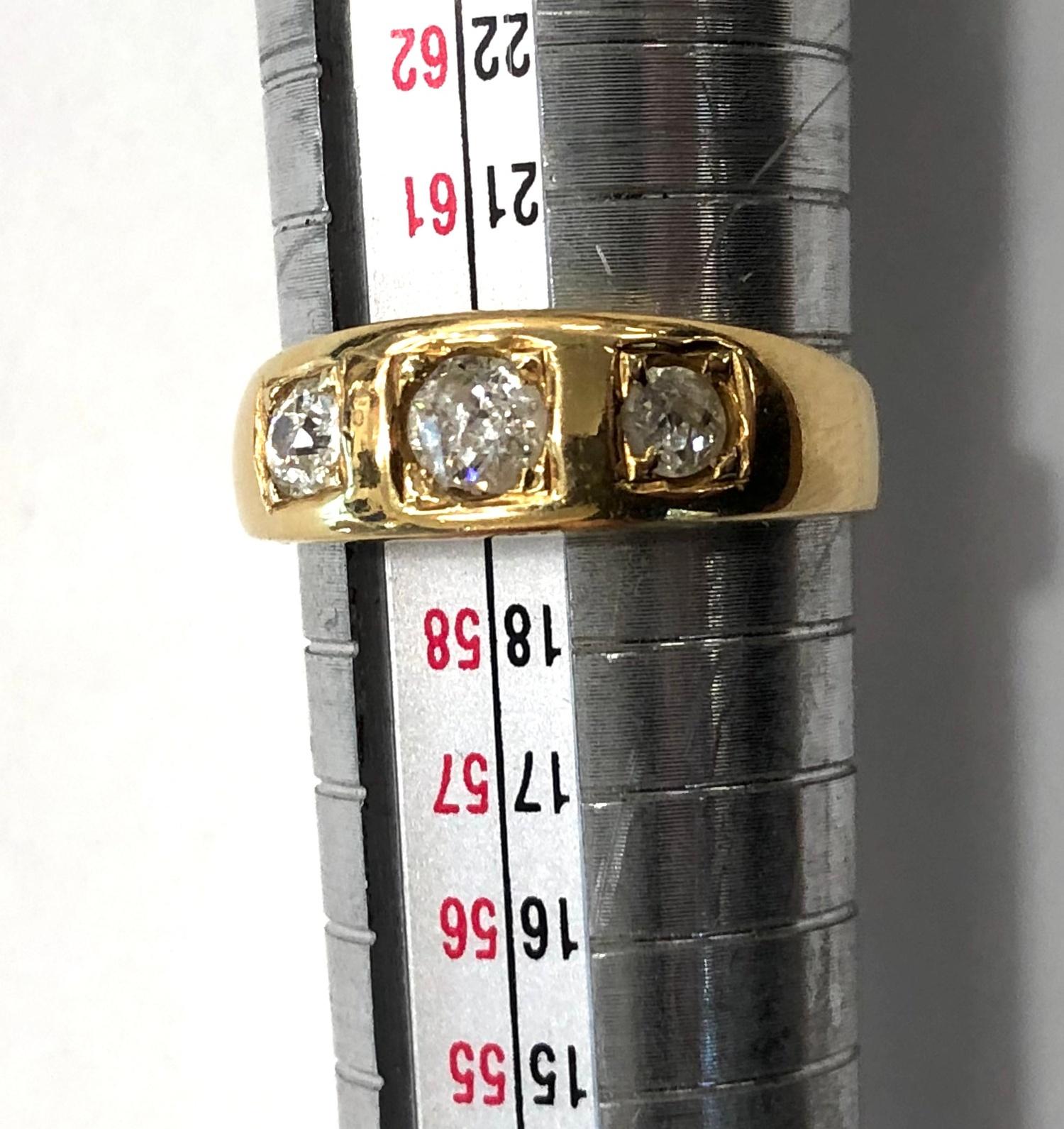 18ct Gold three stone diamond ring the central diamond measures approx 4mm dia weight of ring 6.4g - Image 6 of 6