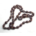 Vintage Cherry amber bakelite type bead necklace shaped beads with small beads in-between measures