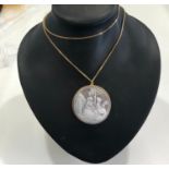 9ct Gold mounted cameo on 9ct chain, chain weight approx 9g