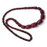 Cherry amber bakelite barrel bead necklace good internal streaking weight 89g
