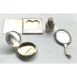 Selection of miniature silver vanity items picture frame , mirror scent bottle and compact
