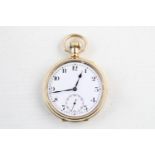 gold plated open face pocket watch winds and ticks but no warranty given
