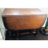 Oak tiger grain gate leg table, approx measurements 36.5 inches length, height 29 inches width