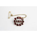 Antique 9ct gold flat cut garnet brooch