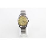 1950s gents omega wristwatch winds and ticks but no warranty given