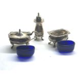 3 piece silver cruet set blue glass liners