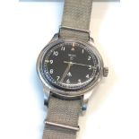 Vintage Smiths military gents wristwatch stainless steel case watch winds and ticks full military