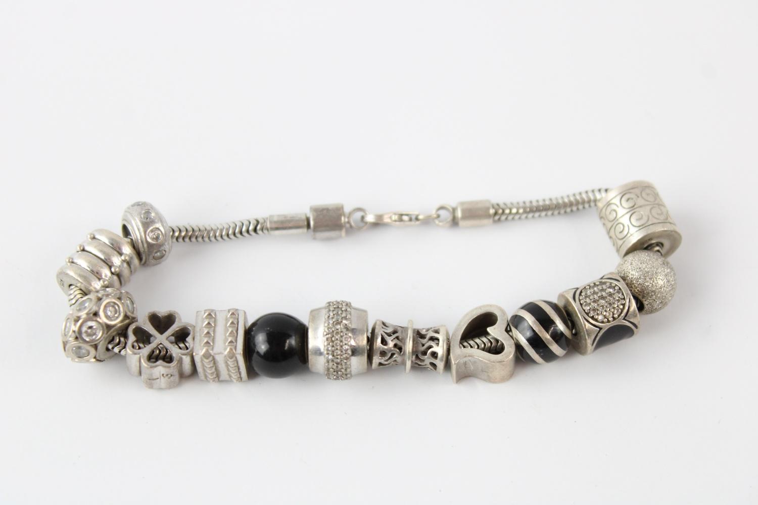 .925 Sterling silver bracelet w/ 13 bead charms