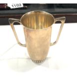 Vintage hallmarked silver stylised twin handled cup (141g)