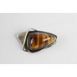 Vintage .925 sterling silver WWL modernist tigers eye brooch