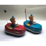 Pair of vintage wind up Japanese tin toys