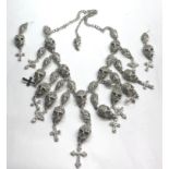 Butler and Wilson Skull necklace and earrings complete with tags