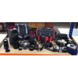 Large collection of cameras includes Nikon Pentax lens and accessories